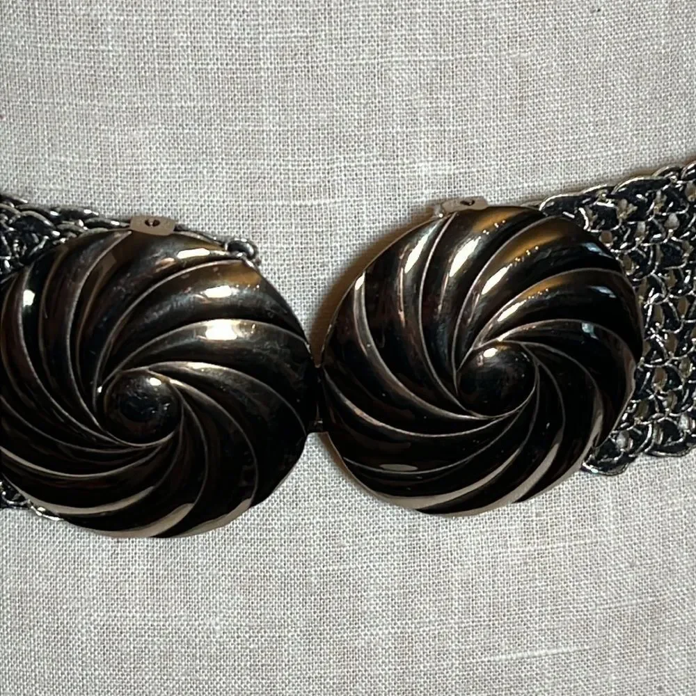 Metallic black and gold woven belt with metal buckle
